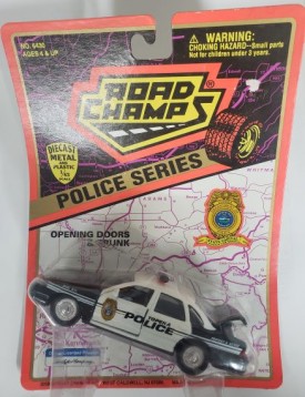 1997 Road Champs Police Series 1/43 Scale Emergency Vehicle Replica - Topeka, Kansas Police Car