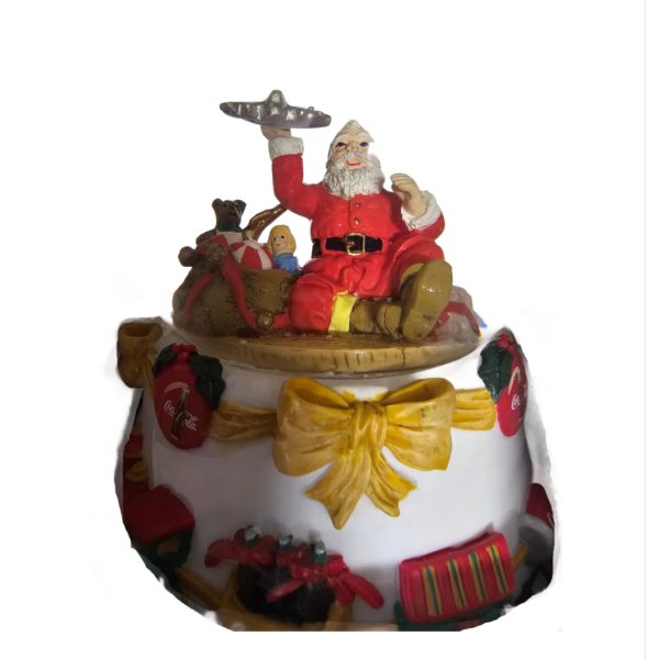 Coca-Cola Snow Globe Santa Sitting Holding Toy Airplane
