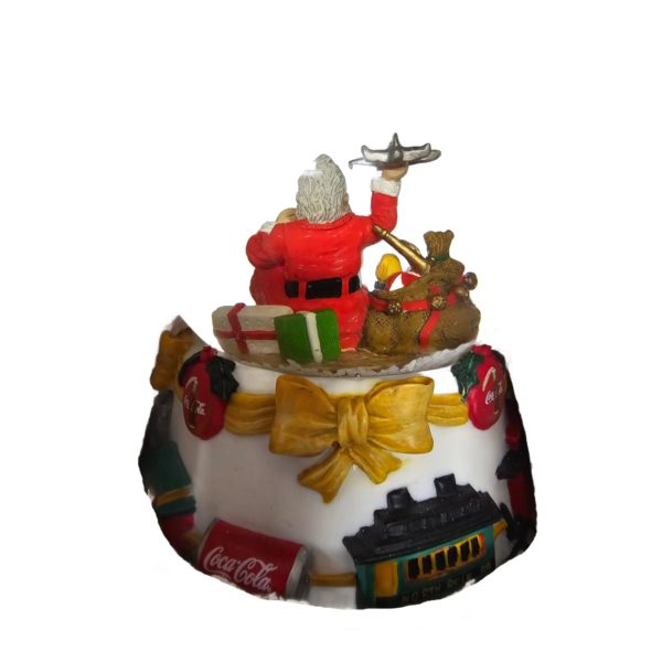 Coca-Cola Snow Globe Santa Sitting Holding Toy Airplane